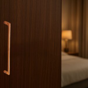 Indite brass cabinet handle on modern wardrobe