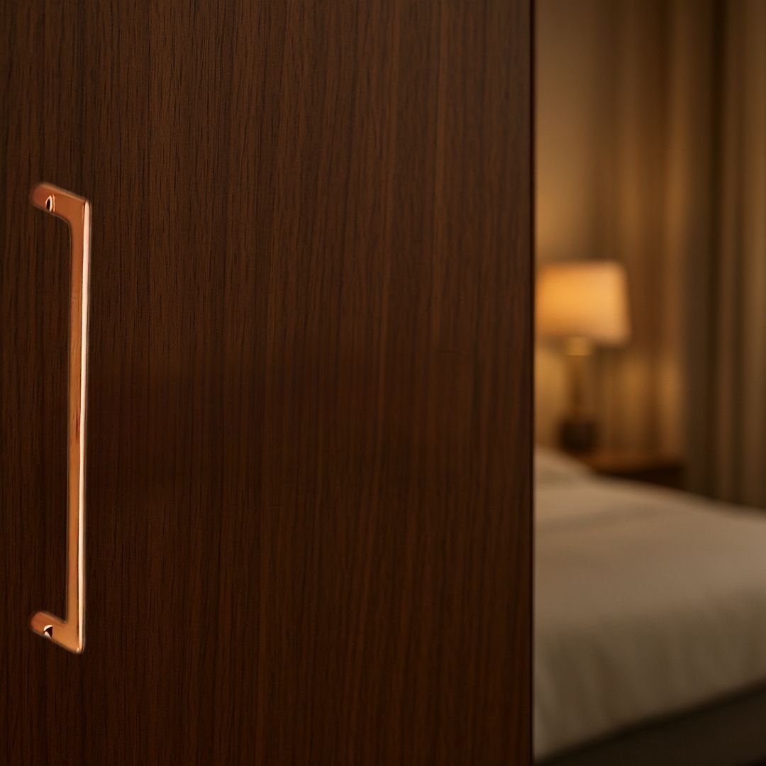 Indite brass cabinet handle on modern wardrobe